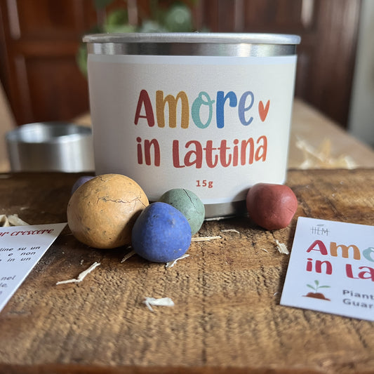 lattina con palline di semi colorate